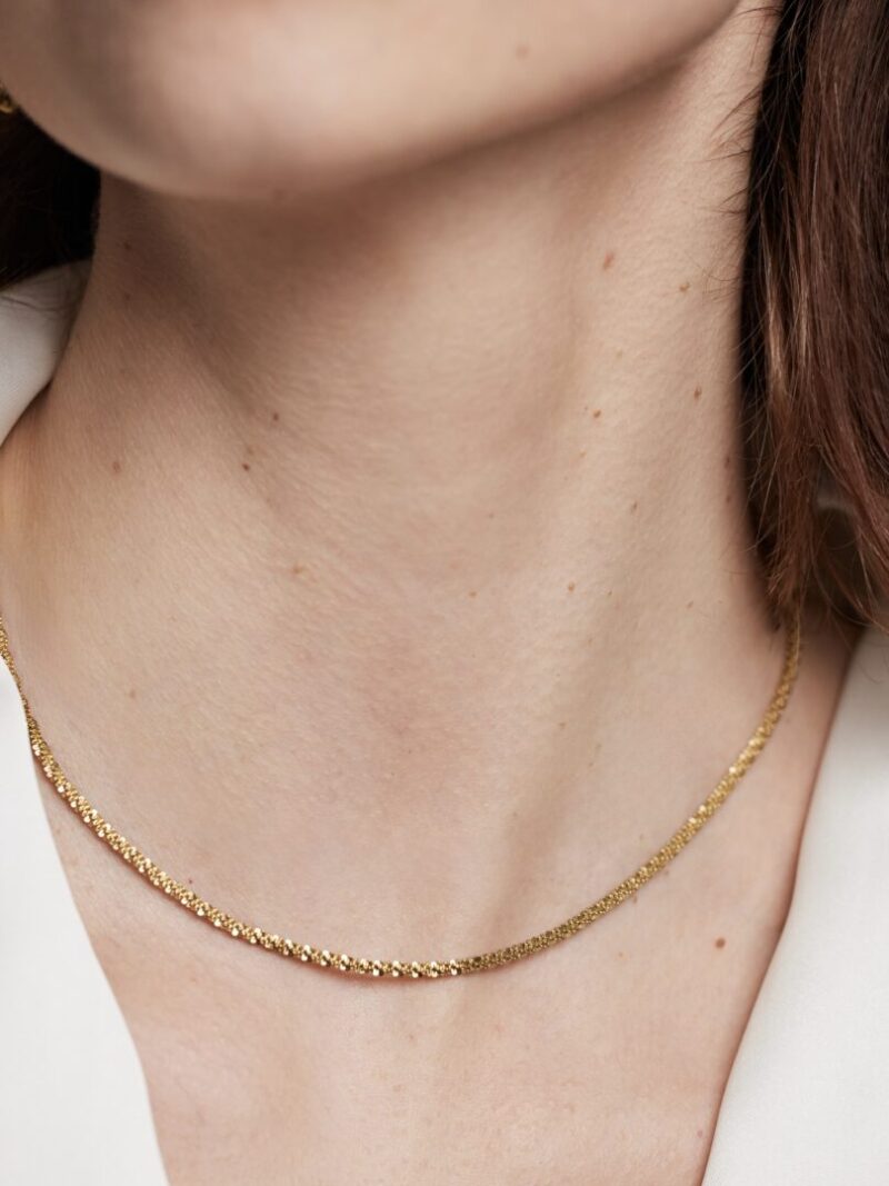 Fijne bewerkte korte ketting - Goud