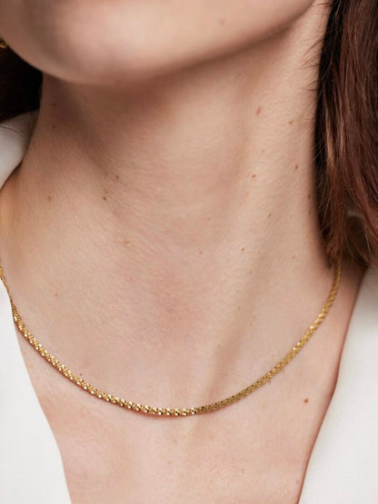 Fijne bewerkte korte ketting - Goud